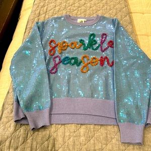 Queen of Sparkles sweater. Never worn size small